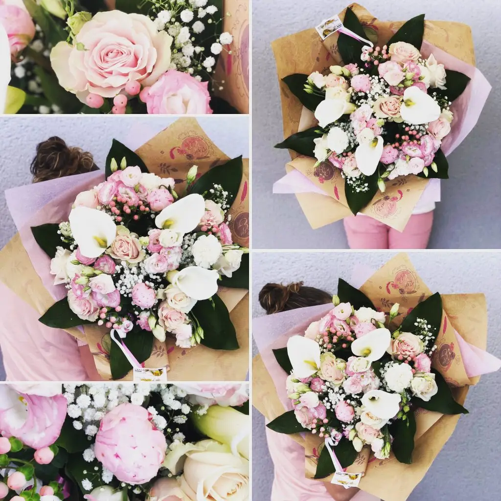 Bouquets de roses et pivoines blanches et roses emballés en papier kraft
